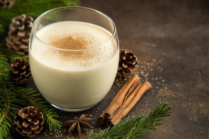 cup of eggnog with nutmeg holiday treat